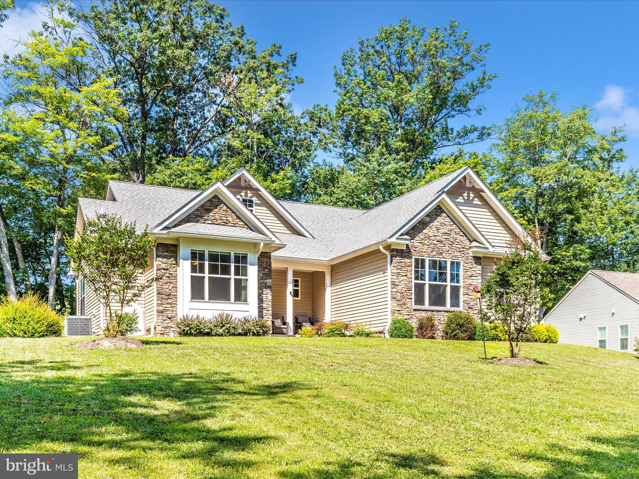 7788 Old Receiver Road Frederick, MD 21702 - Photo 3 of 51 a front view of a house with a yard