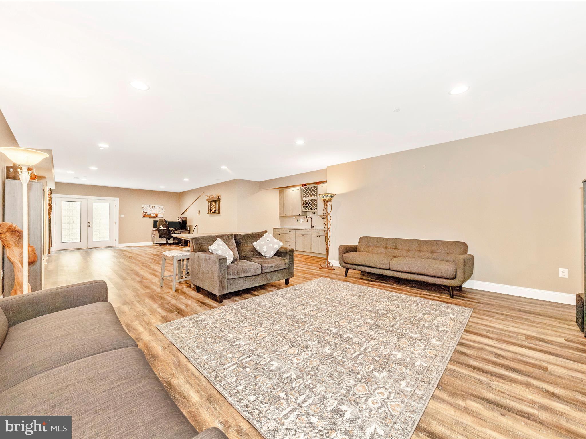 7788 Old Receiver Road Frederick, MD 21702 - Photo 40 of 51 a living room with furniture and a rug