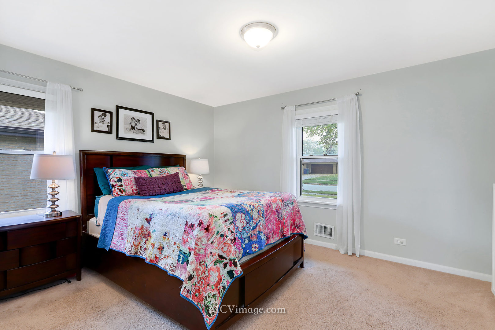 5830 108th Place Chicago Ridge, IL 60415 - Photo 17 of 28 a bedroom with a bed and a window