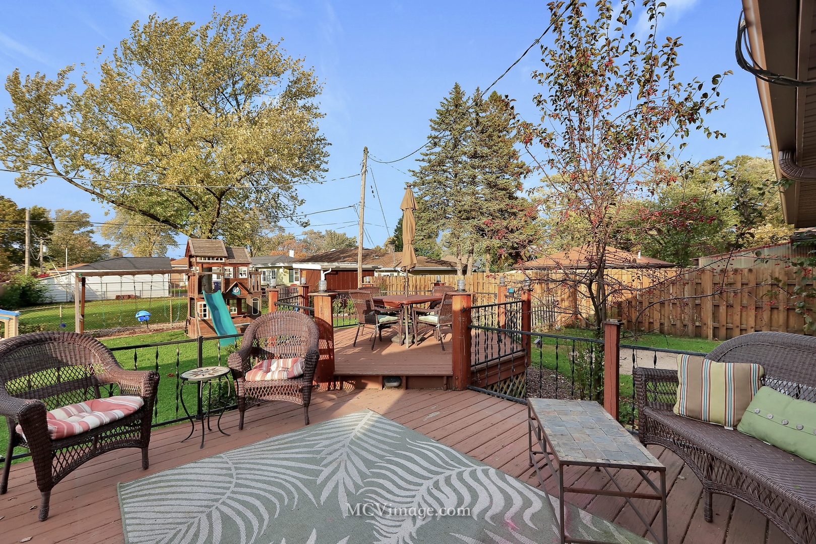 5830 108th Place Chicago Ridge, IL 60415 - Photo 22 of 28 a view of a patio with couches table and chairs and potted plants