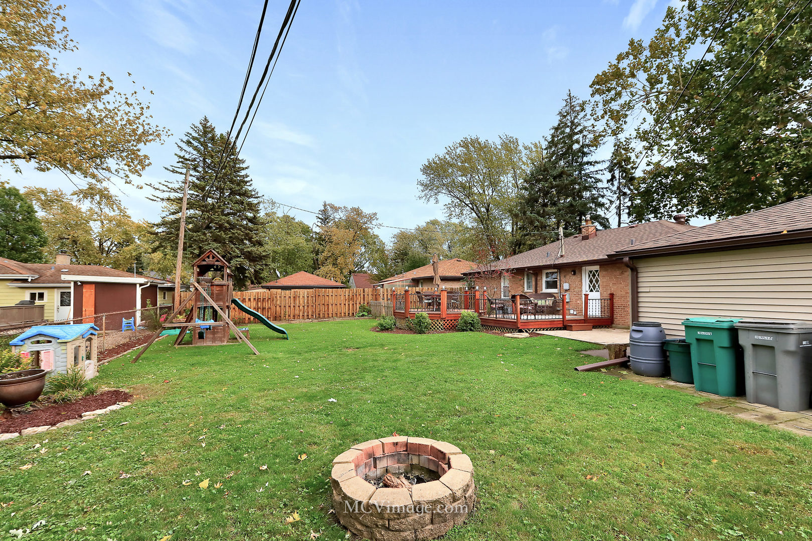 5830 108th Place Chicago Ridge, IL 60415 - Photo 24 of 28 a view of a house with a backyard porch and sitting area