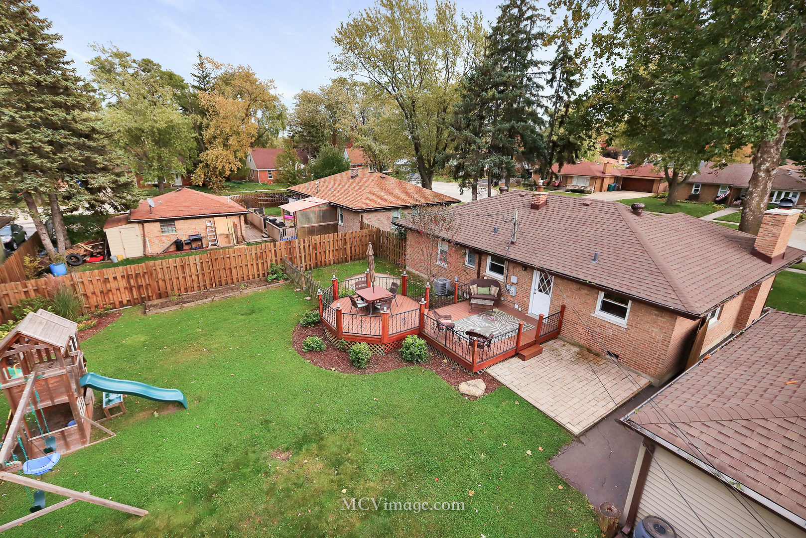 5830 108th Place Chicago Ridge, IL 60415 - Photo 27 of 28 an aerial view of a house with backyard space and balcony