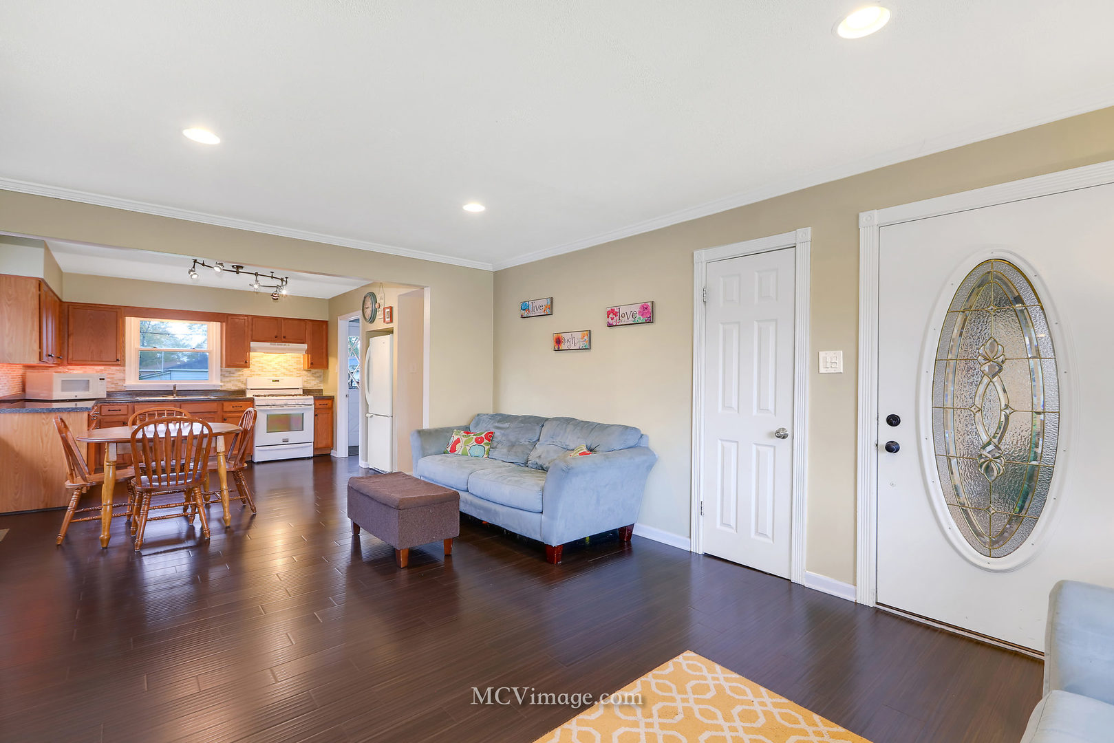 5830 108th Place Chicago Ridge, IL 60415 - Photo 6 of 28 a living room with furniture and a wooden floor