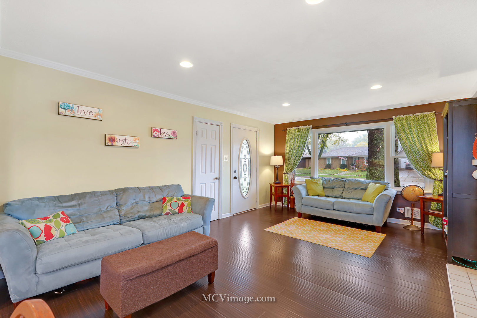 5830 108th Place Chicago Ridge, IL 60415 - Photo 7 of 28 a living room with furniture and a large window