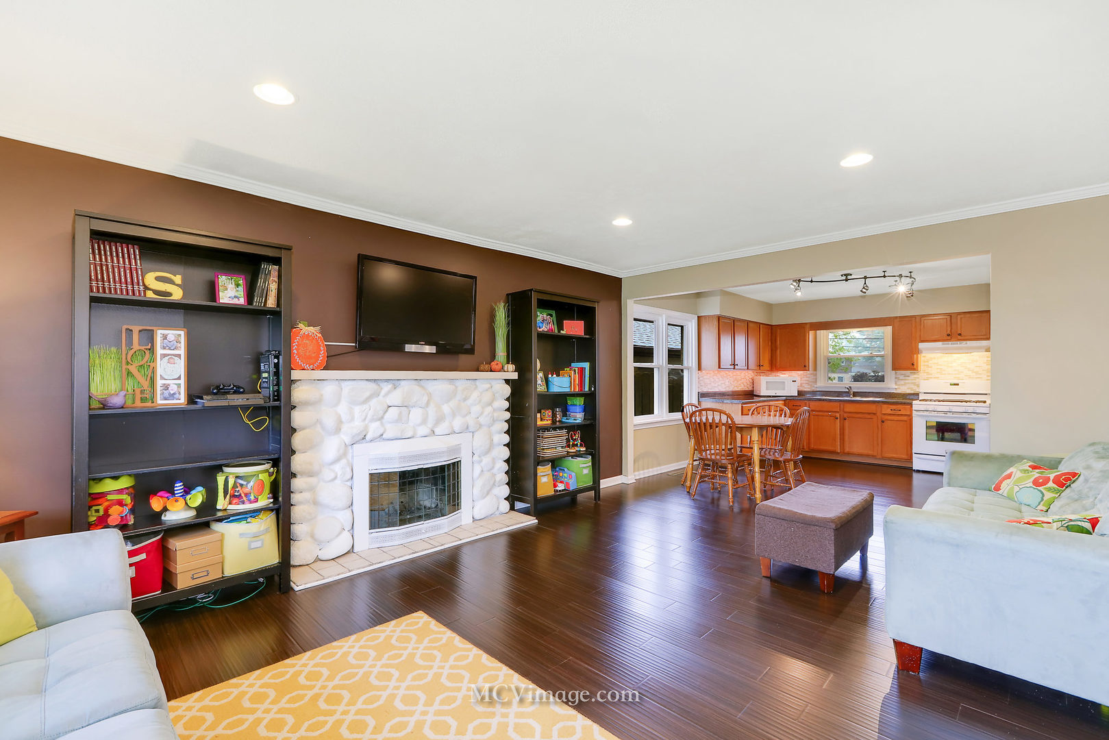 5830 108th Place Chicago Ridge, IL 60415 - Photo 8 of 28 a living room with furniture fireplace and flat screen tv