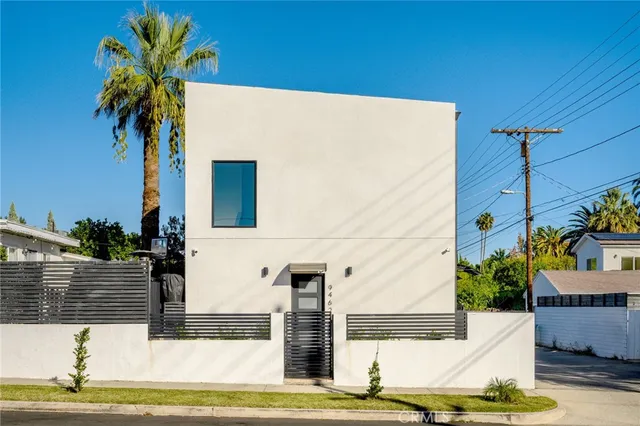 a front view of a house with street