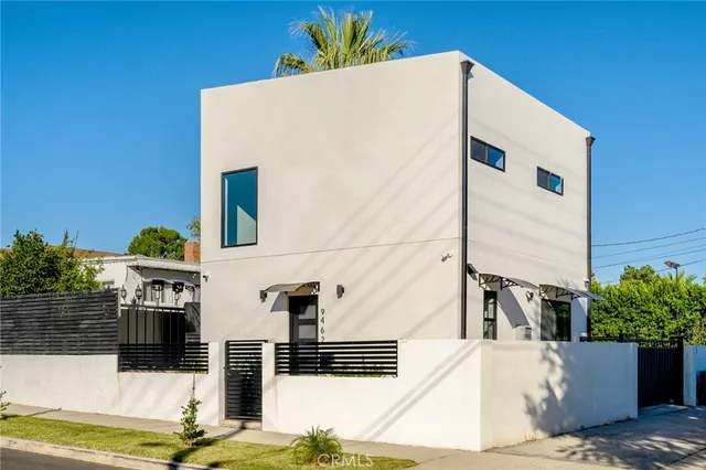 a view of a house with a street