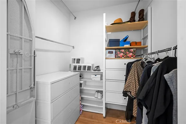 a bathroom with a toilet sink and shower
