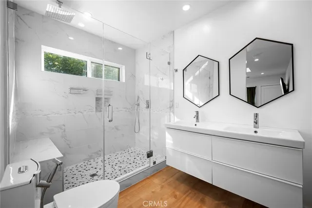 a living room with a bed and a window