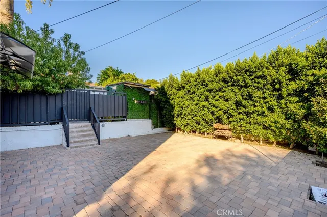 a house view with a garden space