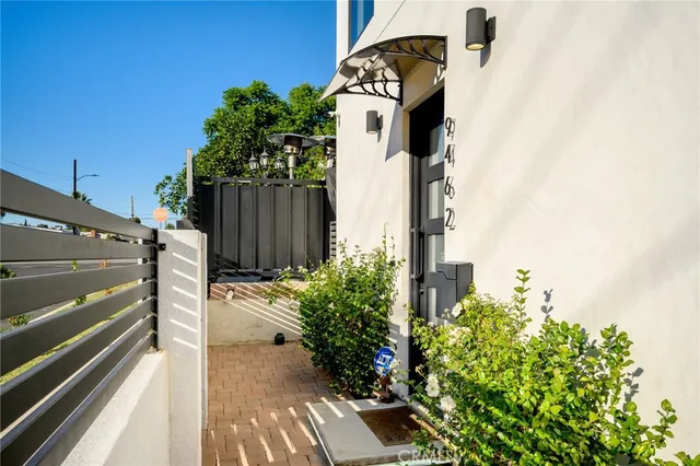 a view of a house with a street