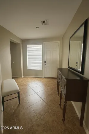 a workspace with furniture and window