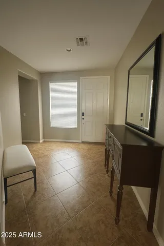 a workspace with furniture and window