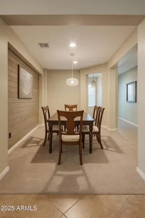 a view of a dining room with furniture