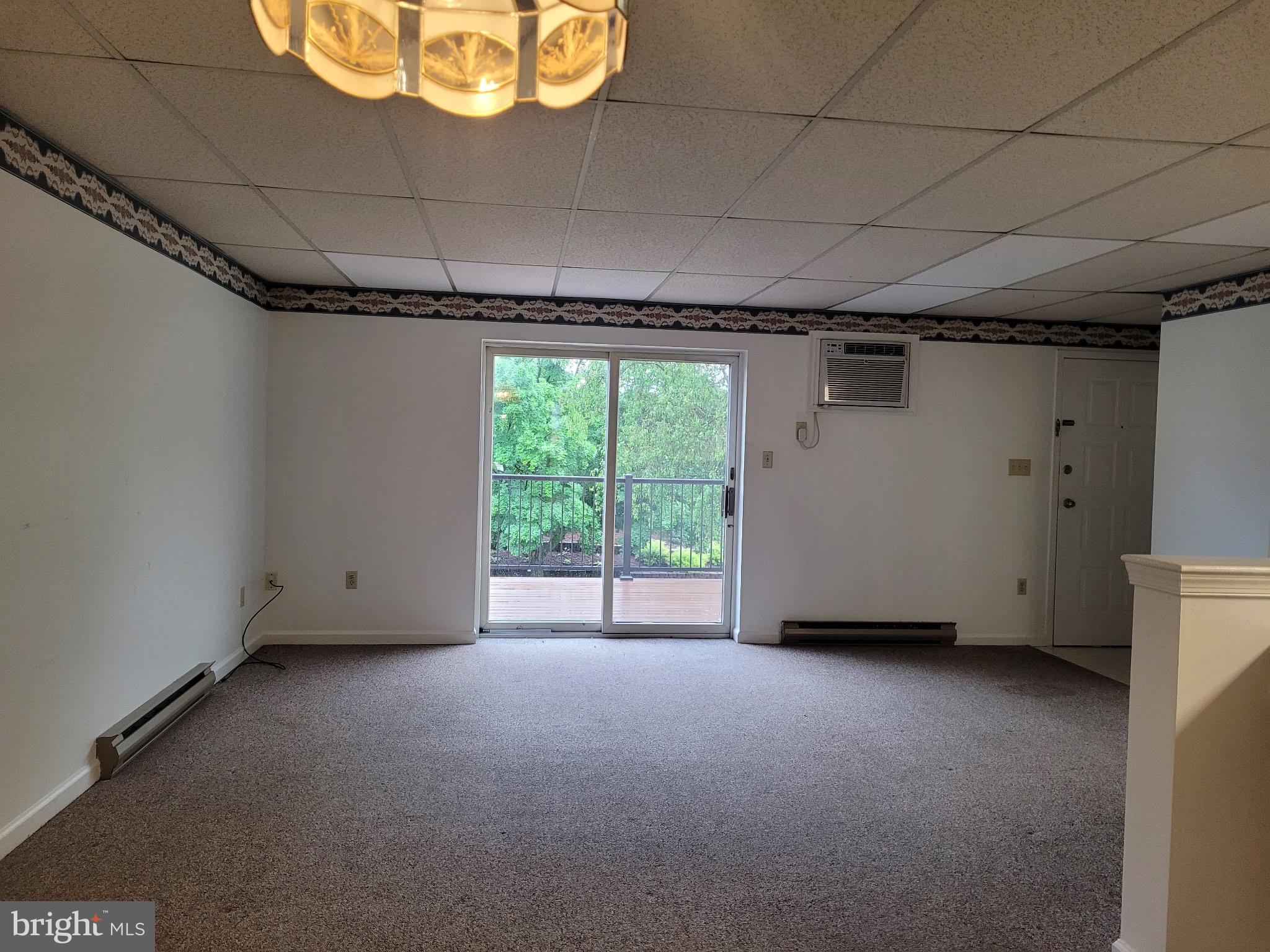 119 Hamilton Avenue Waynesboro, PA 17268 - Photo 2 of 12 a view of a room with window and a wooden floor