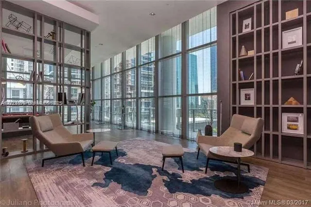 a view of a swimming pool and a yard