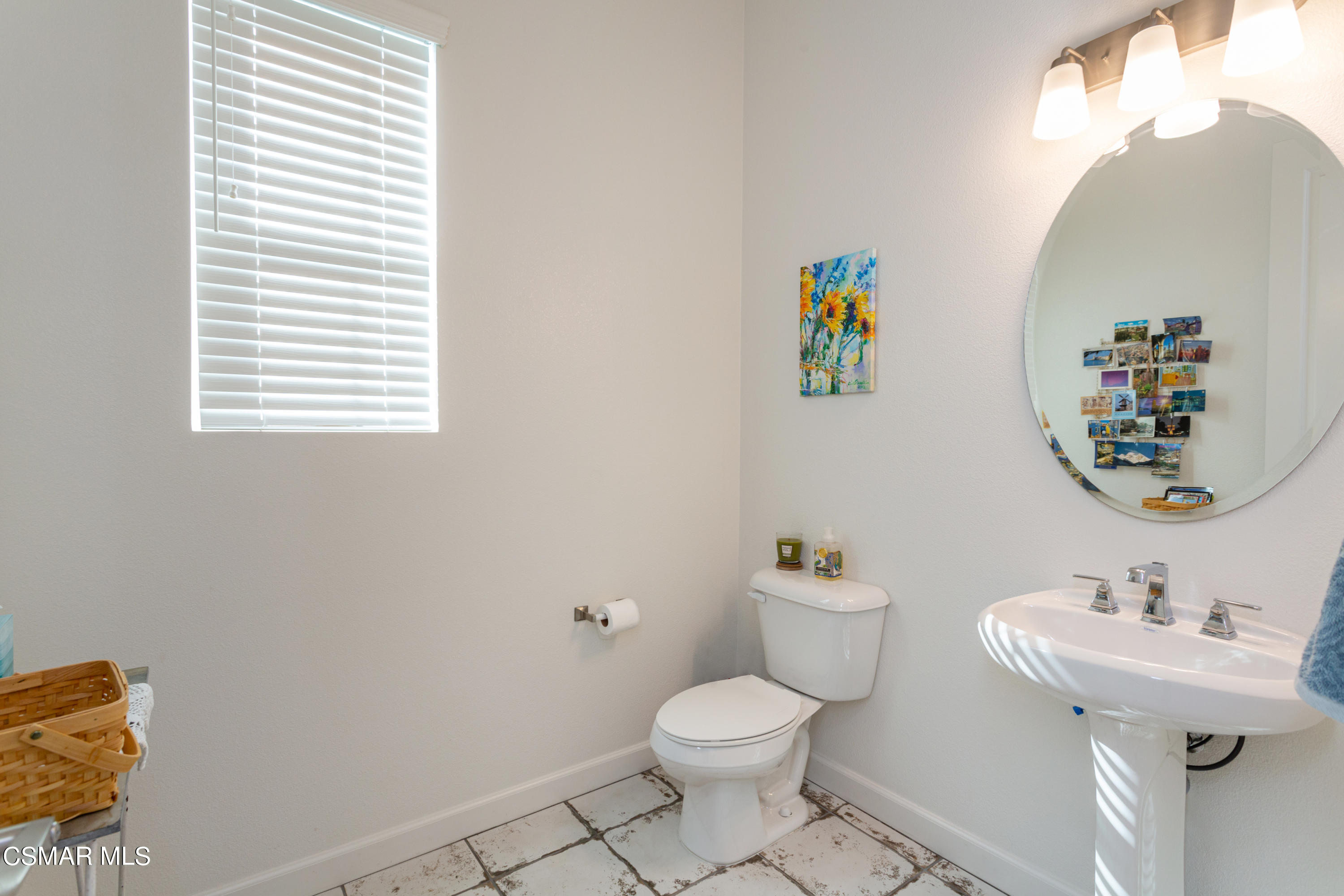 1620 Range Road Oxnard, CA 93036 - Photo 12 of 34 a bathroom with a sink mirror and toilet