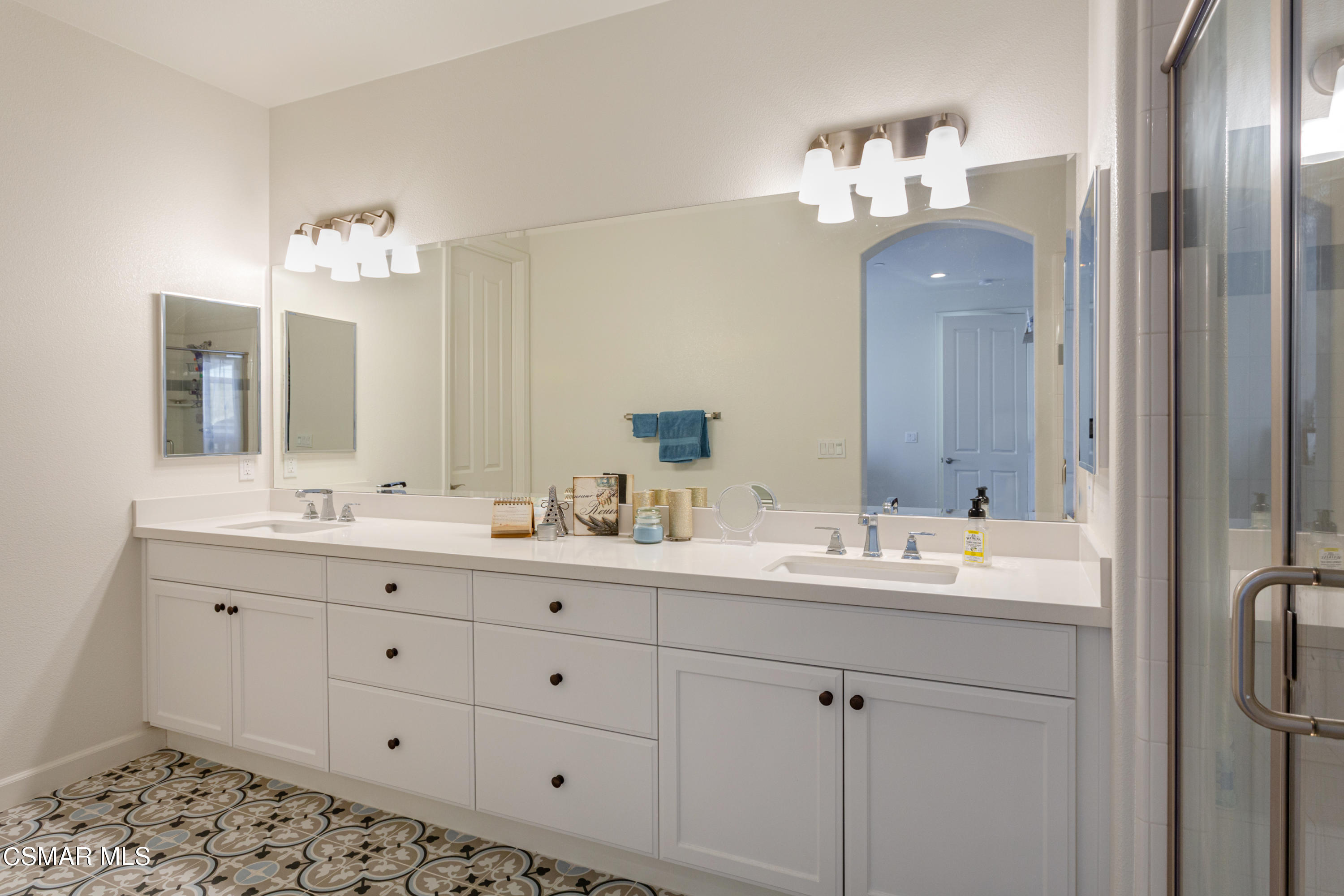 1620 Range Road Oxnard, CA 93036 - Photo 15 of 34 a bathroom with a double vanity sink mirror and