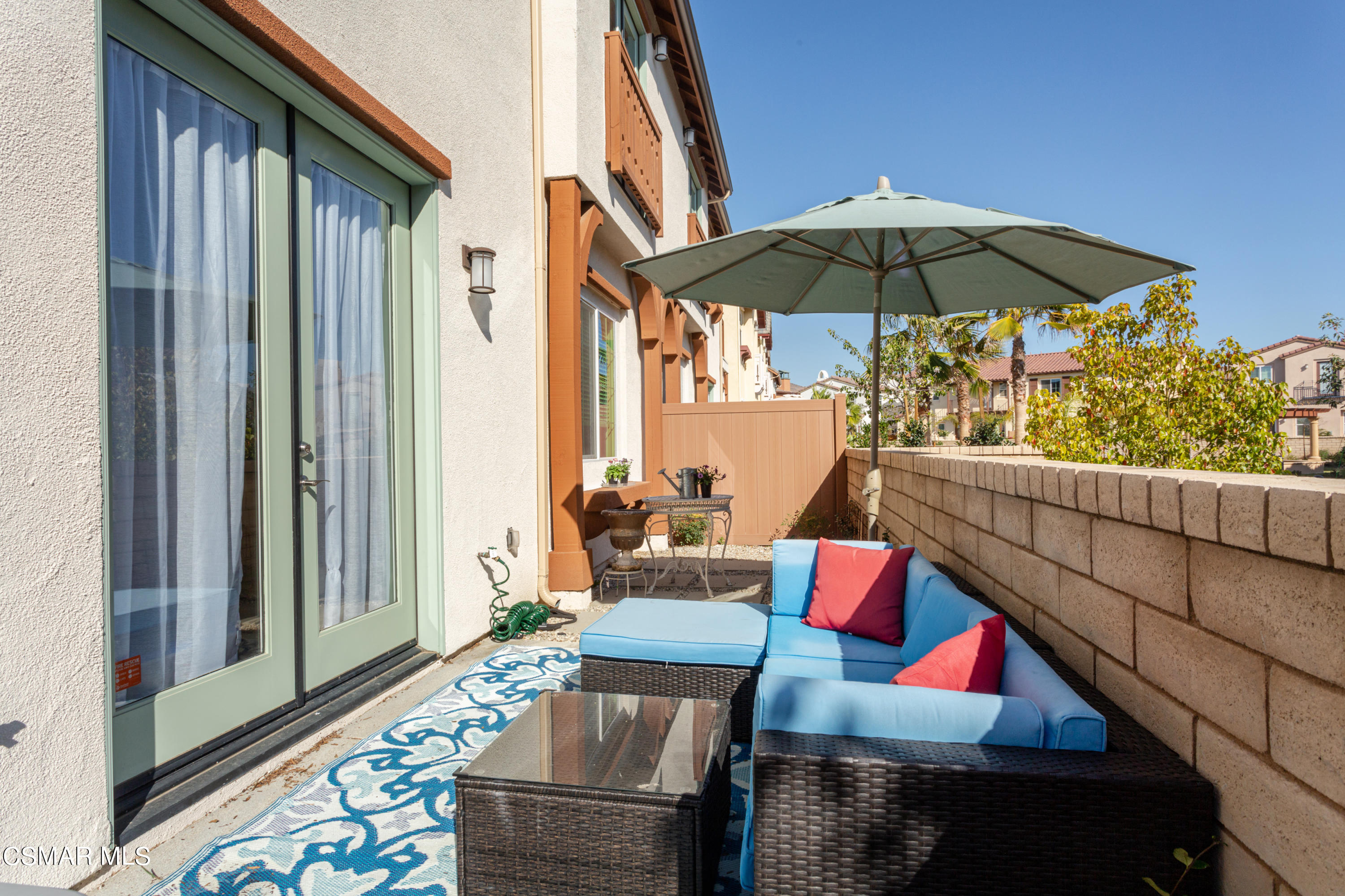 1620 Range Road Oxnard, CA 93036 - Photo 24 of 34 a view of deck with furniture and umbrella