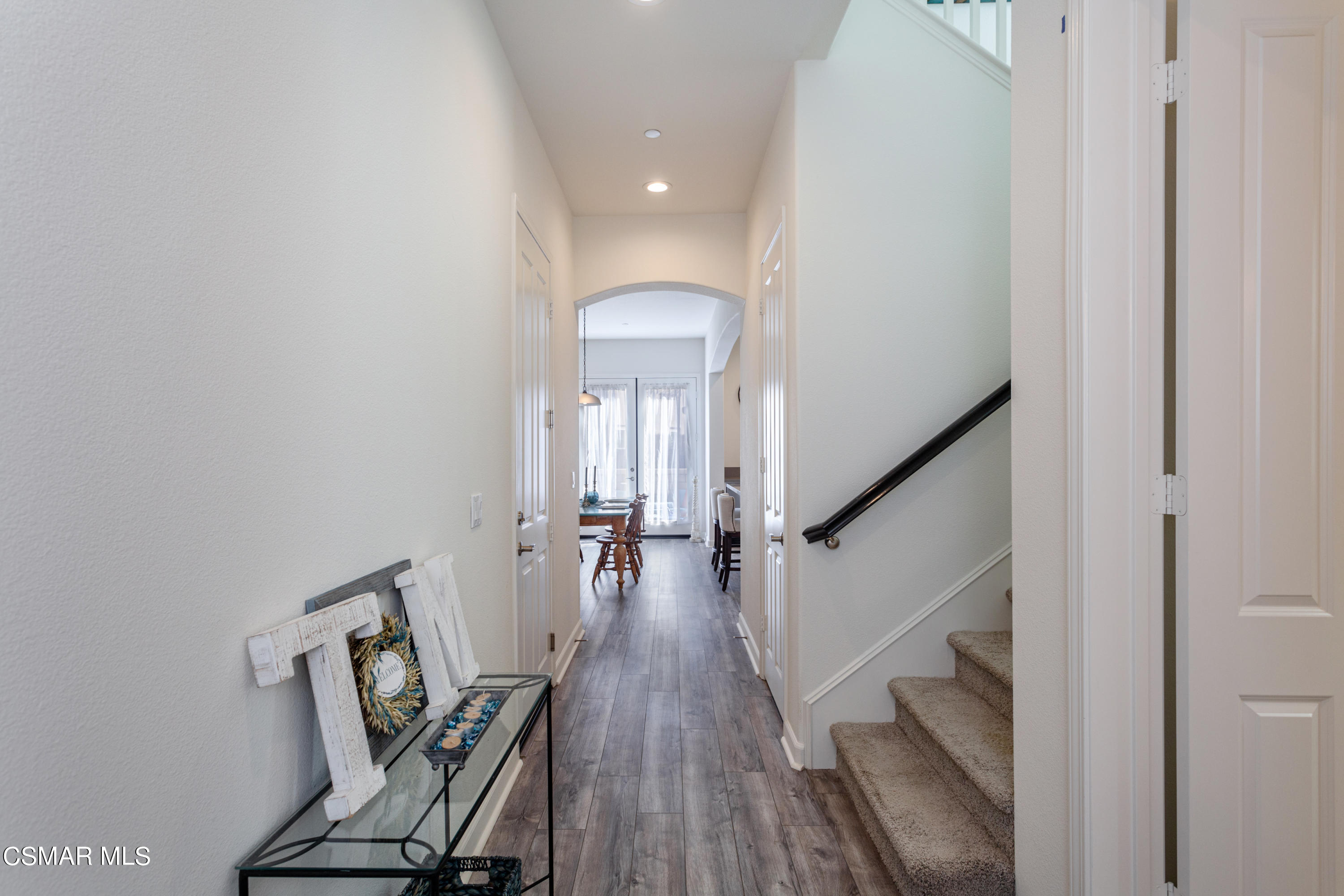 1620 Range Road Oxnard, CA 93036 - Photo 5 of 34 a view of a hallway with wooden floor and staircase
