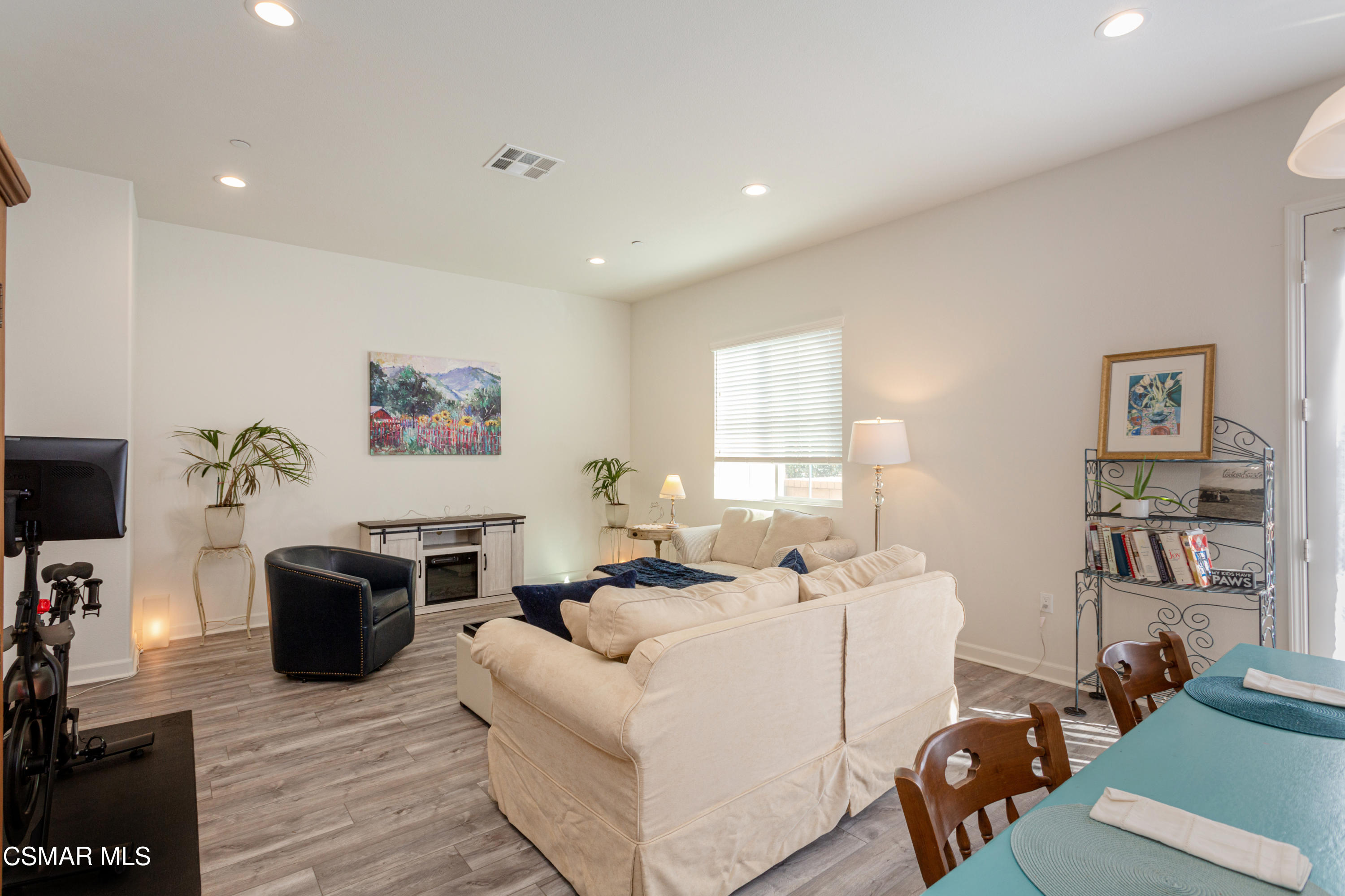 1620 Range Road Oxnard, CA 93036 - Photo 7 of 34 a living room with furniture a flat screen tv and a window