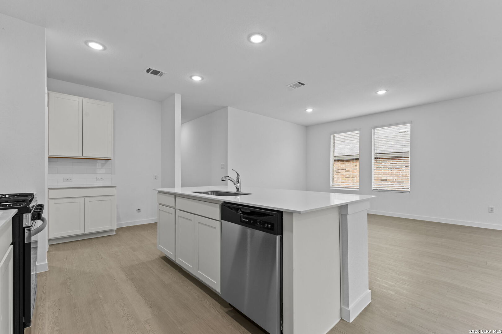 2307 Fort Davis Pass Marion, TX 78124 - Photo 19 of 31 a kitchen with a sink window and cabinets