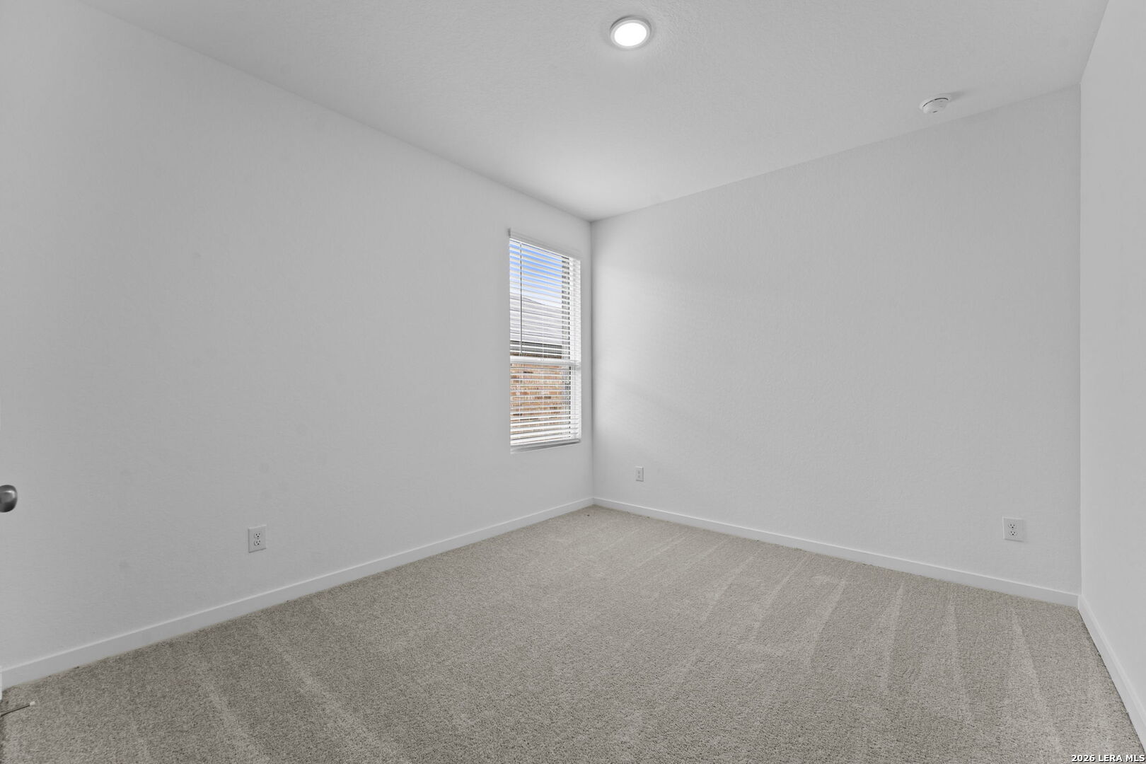 2307 Fort Davis Pass Marion, TX 78124 - Photo 4 of 31 an empty room with a window