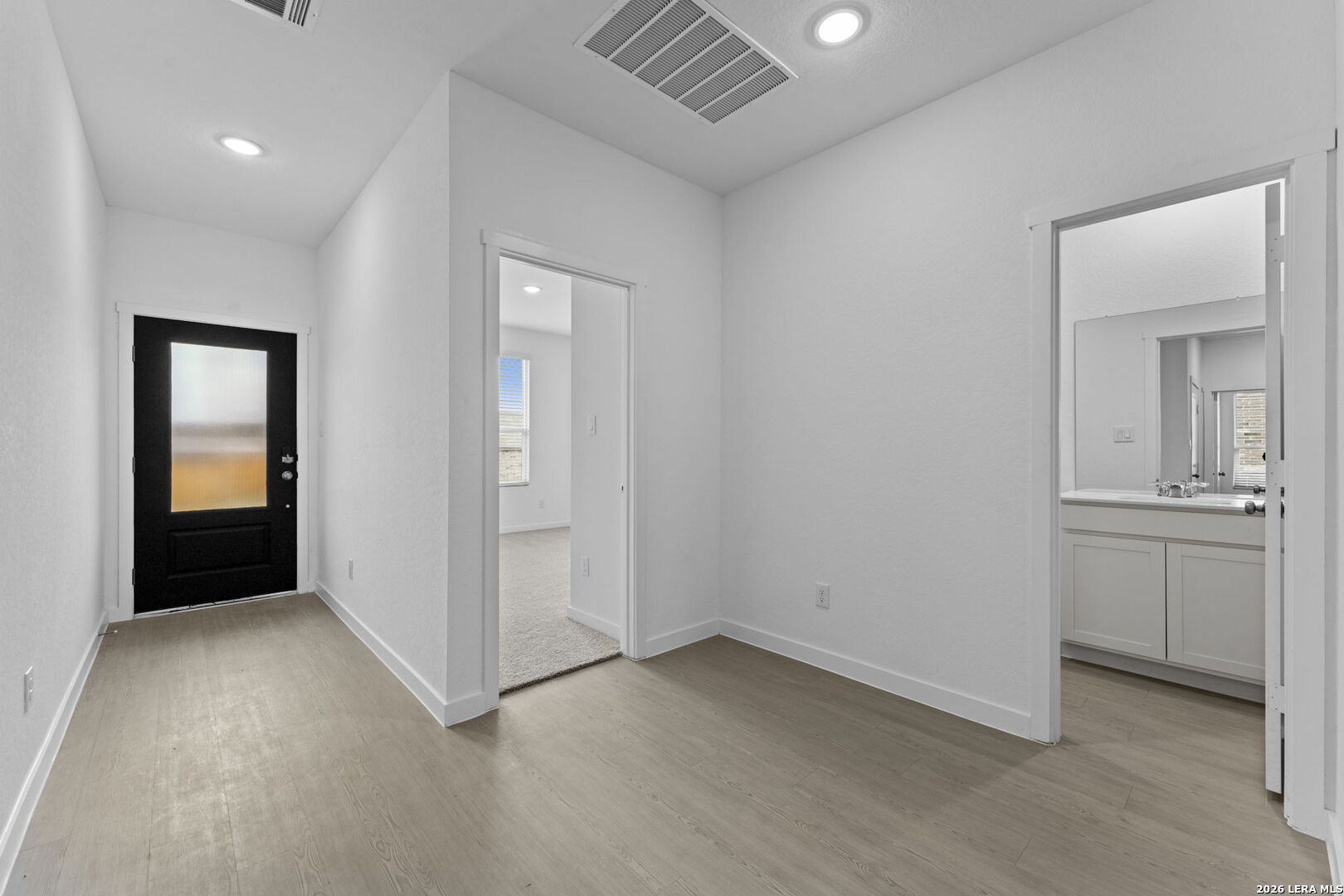 2307 Fort Davis Pass Marion, TX 78124 - Photo 6 of 31 an empty room with a bathroom and mirror