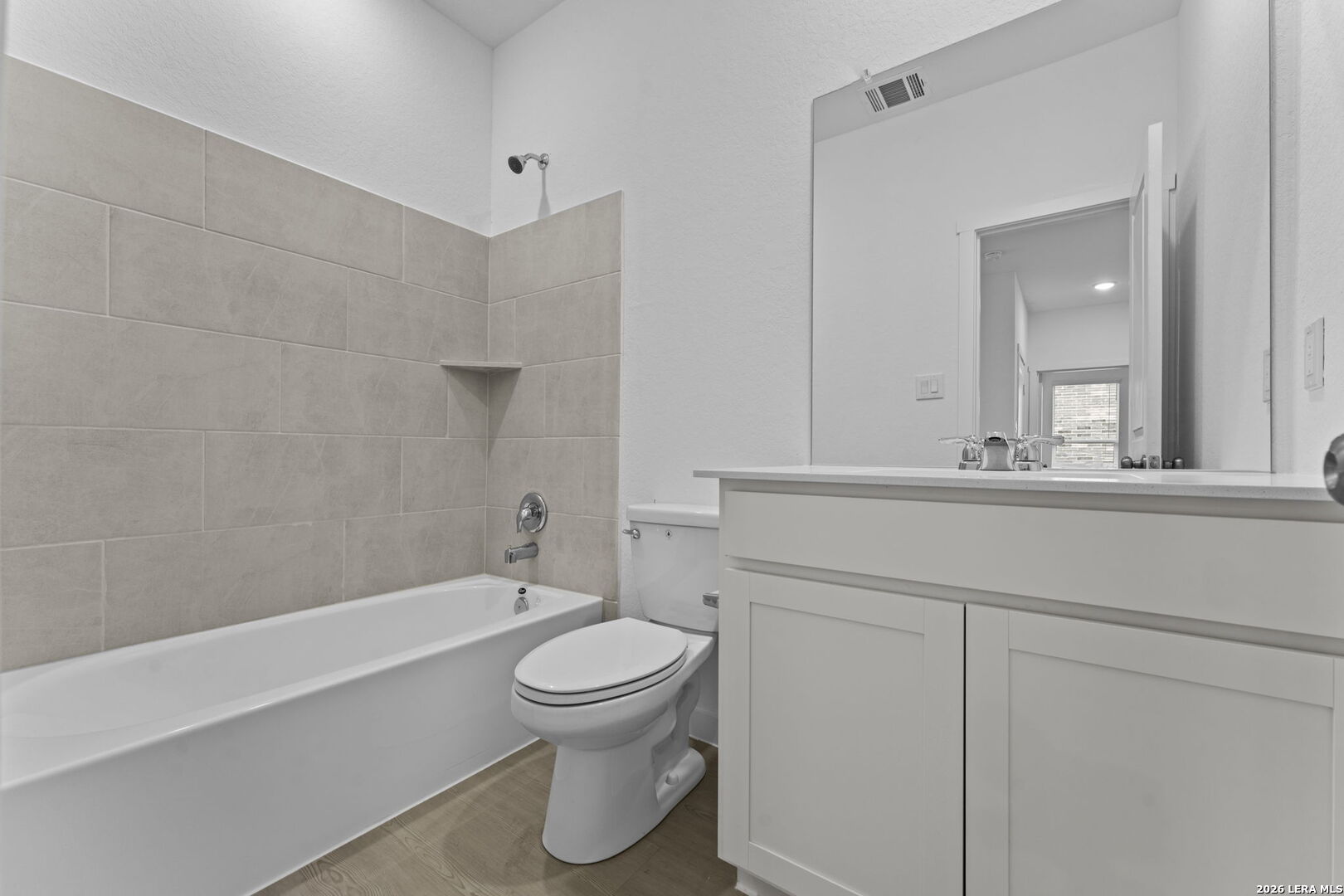 2307 Fort Davis Pass Marion, TX 78124 - Photo 7 of 31 a bathroom with a toilet a sink and bathtub