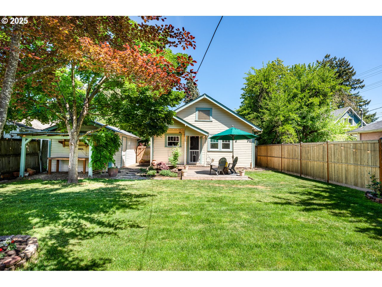 945 B Street Springfield, OR 97477 - Photo 33 of 35 a house view with a sitting space and garden