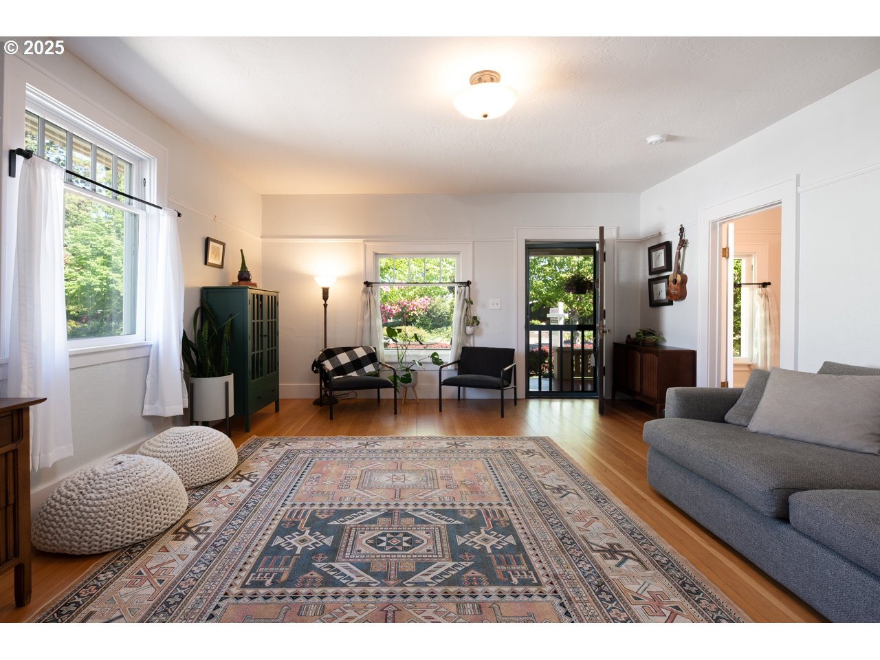945 B Street Springfield, OR 97477 - Photo 7 of 35 a living room with furniture and a wooden floor