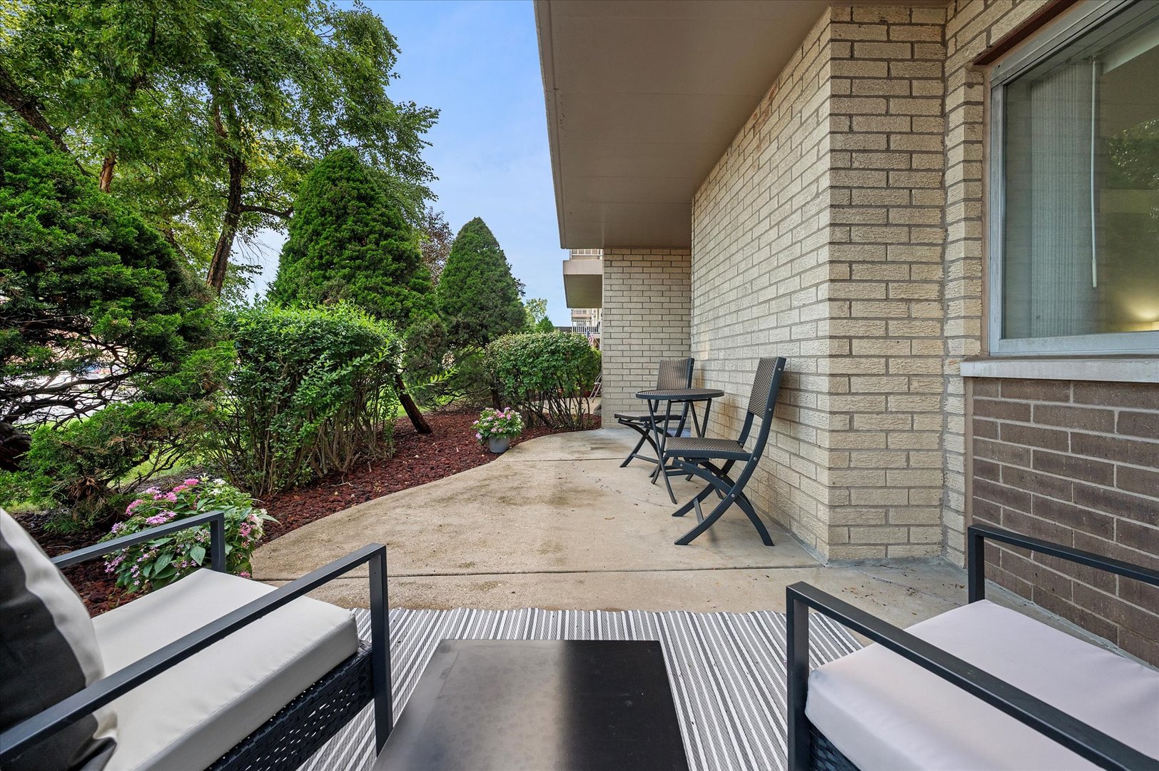 100 West Butterfield Road, Unit 101N Elmhurst, IL 60126 - Photo 20 of 27 a view of outdoor space with seating