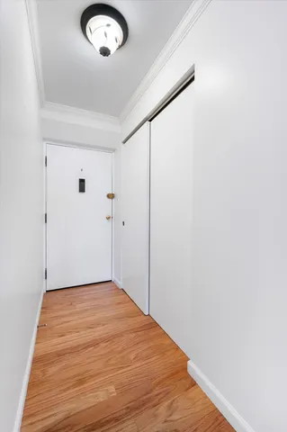 a view of a livingroom with wooden floor