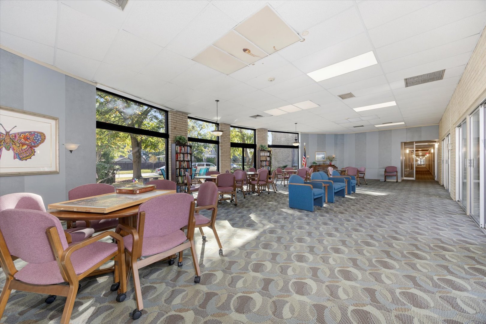 100 West Butterfield Road, Unit 101N Elmhurst, IL 60126 - Photo 25 of 27 a view of a dining room with furniture window and outside view