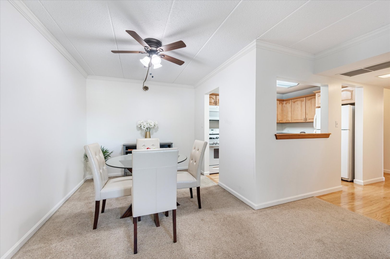 100 West Butterfield Road, Unit 101N Elmhurst, IL 60126 - Photo 6 of 27 a dining room with furniture and window