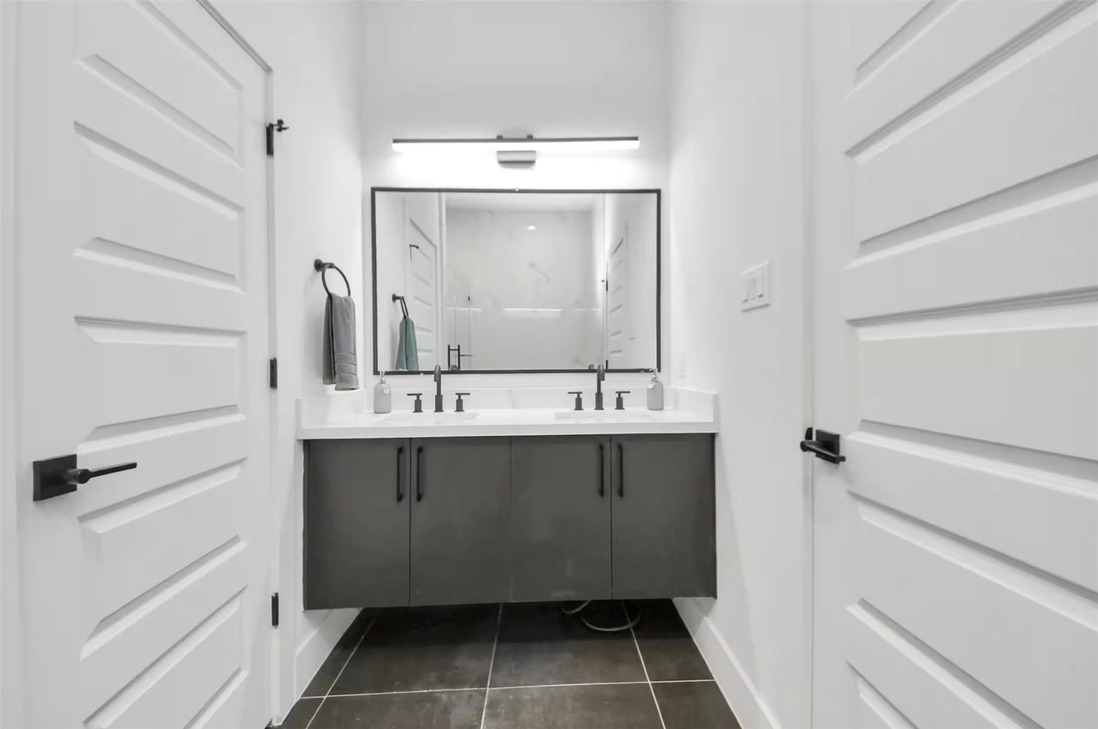 3521 Mainer Street Houston, TX 77021 - Photo 29 of 37 a bathroom with a sink a mirror and a toilet