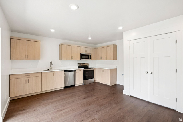 1615 North Angel Street West Layton, UT 84041 - Photo 5 of 22 Kitchen with light brown cabinets, modern cabinets, appliances with stainless steel finishes, recessed lighting, and dark wood-type flooring