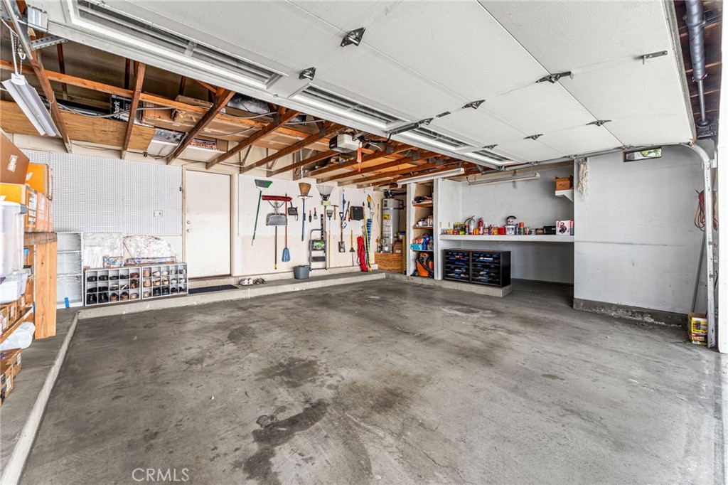 424 Walker Road San Dimas, CA 91773 - Photo 21 of 23 Spacious garage with bench