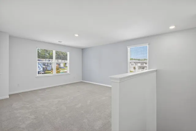 an empty room with windows