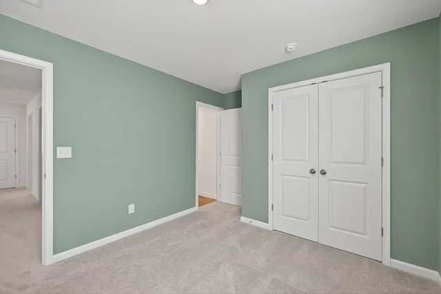 a bathroom with a sink toilet vanity and tub