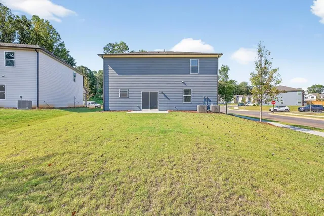 a house view with a outdoor space