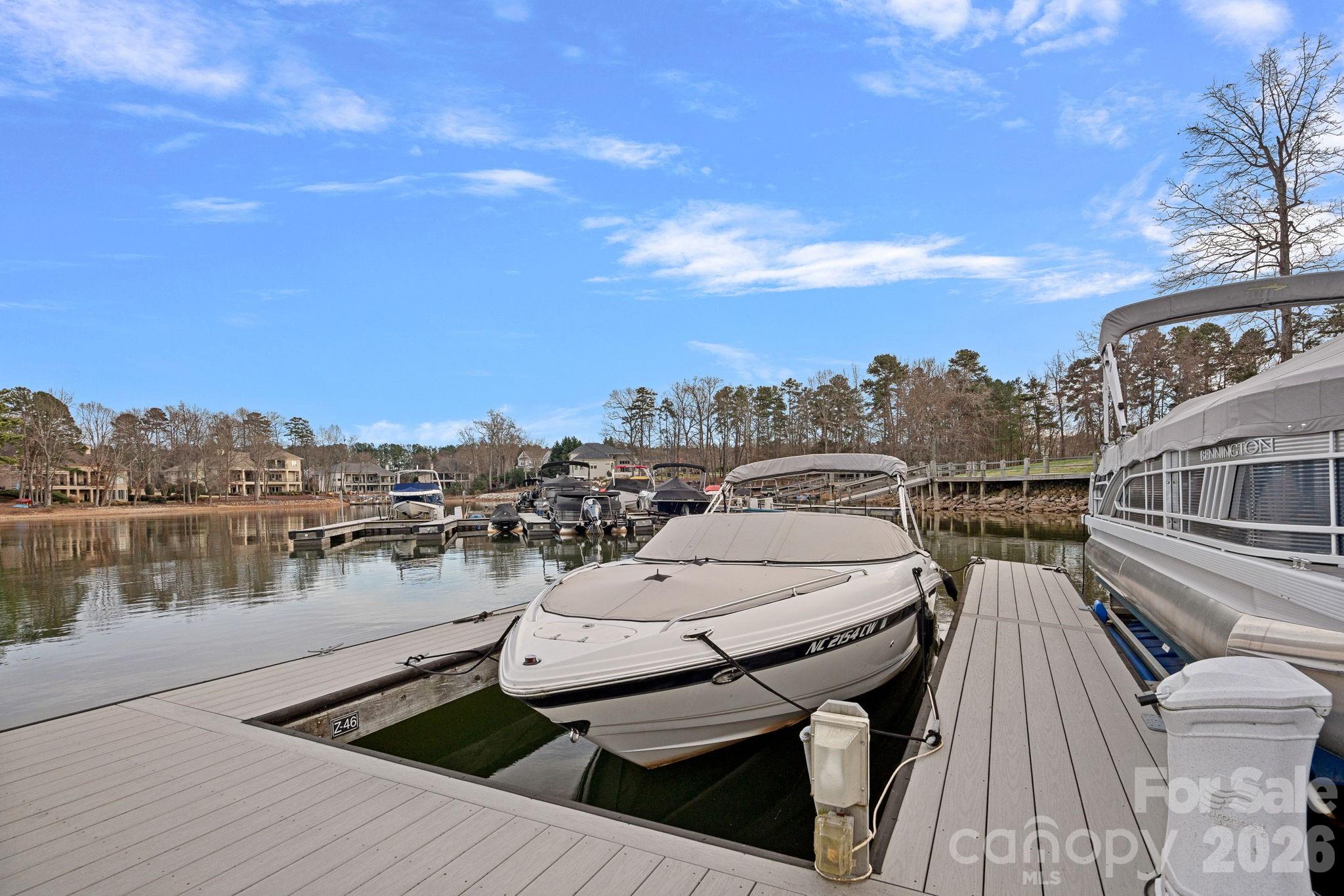 123 Cape Cod Way Mooresville, NC 28117 - Photo 2 of 48 a view of a roof deck with couches and wooden floor