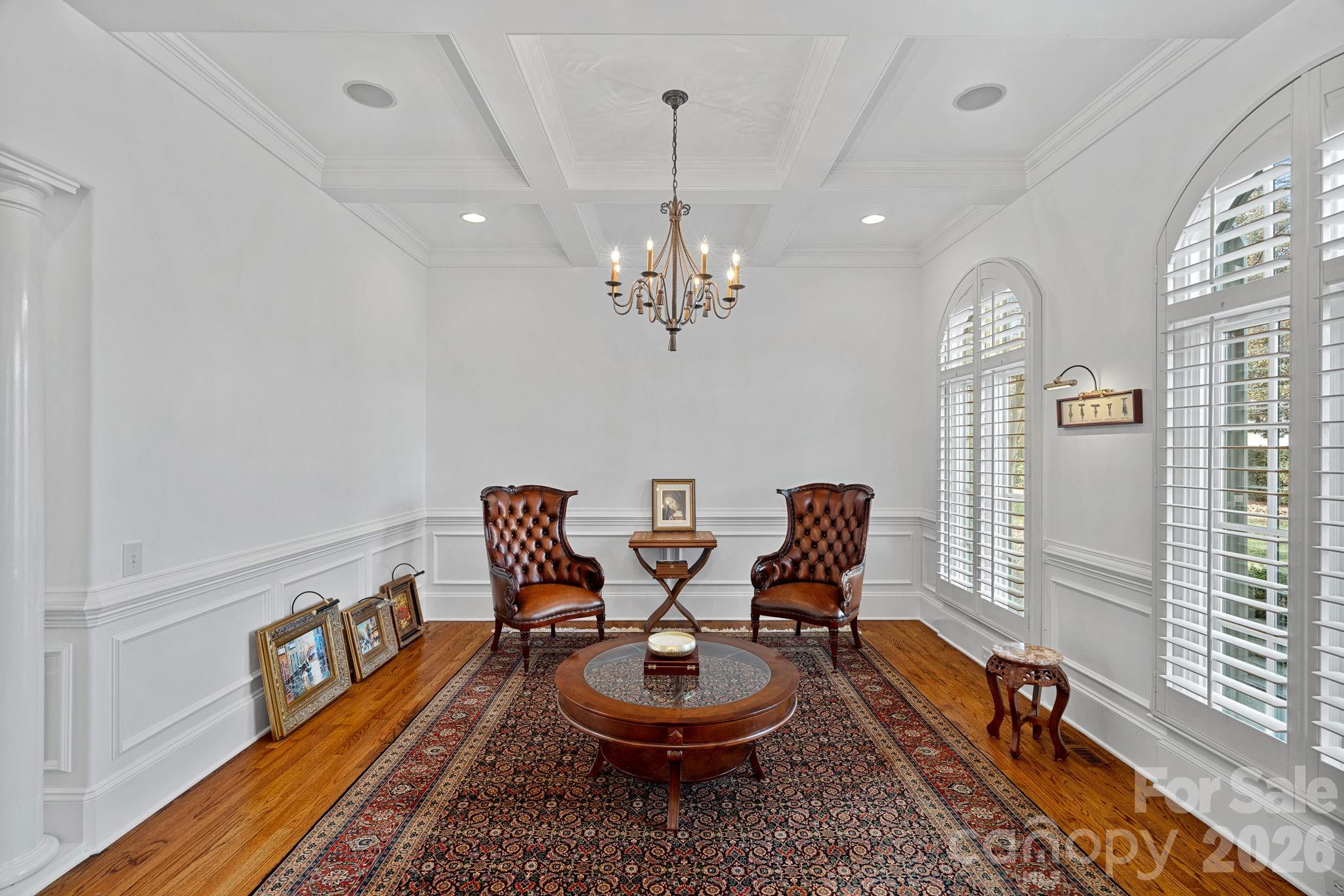123 Cape Cod Way Mooresville, NC 28117 - Photo 8 of 48 a view of a dining room with furniture and a chandelier
