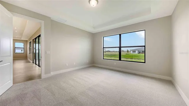 an empty room with windows