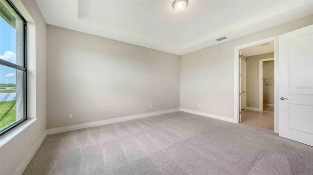 an empty room with windows