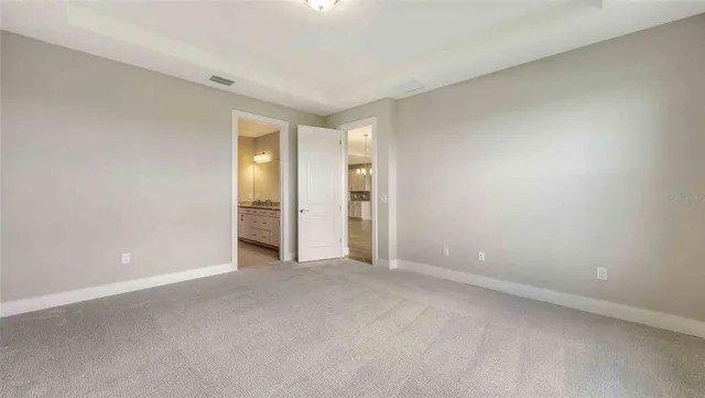 a view of an empty room and window