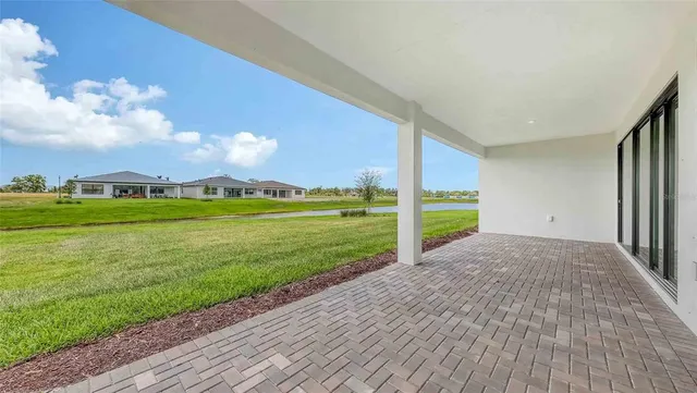 a view of a house with a big yard