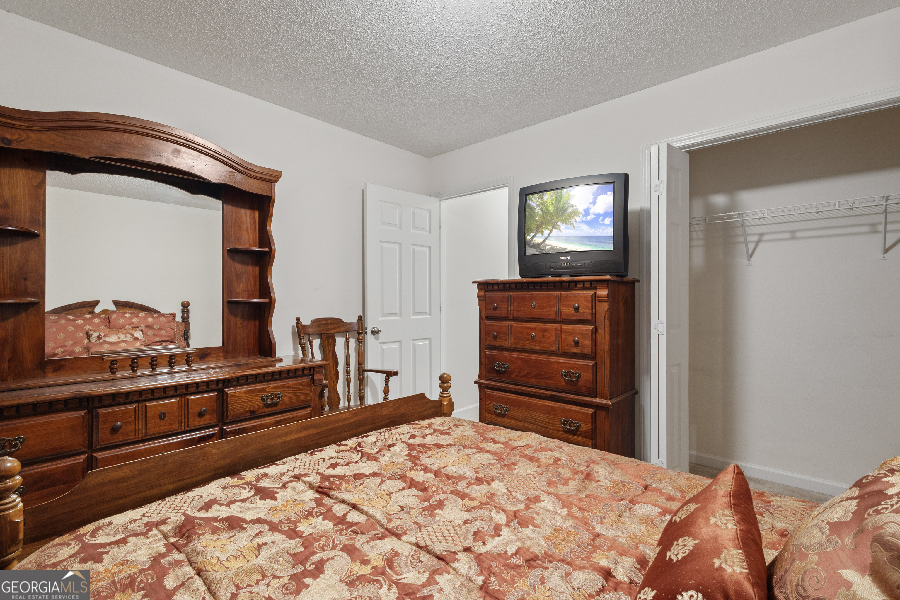 1275 Ross St Lane Macon, GA 31201 - Photo 15 of 20 a bedroom with a bed and furniture