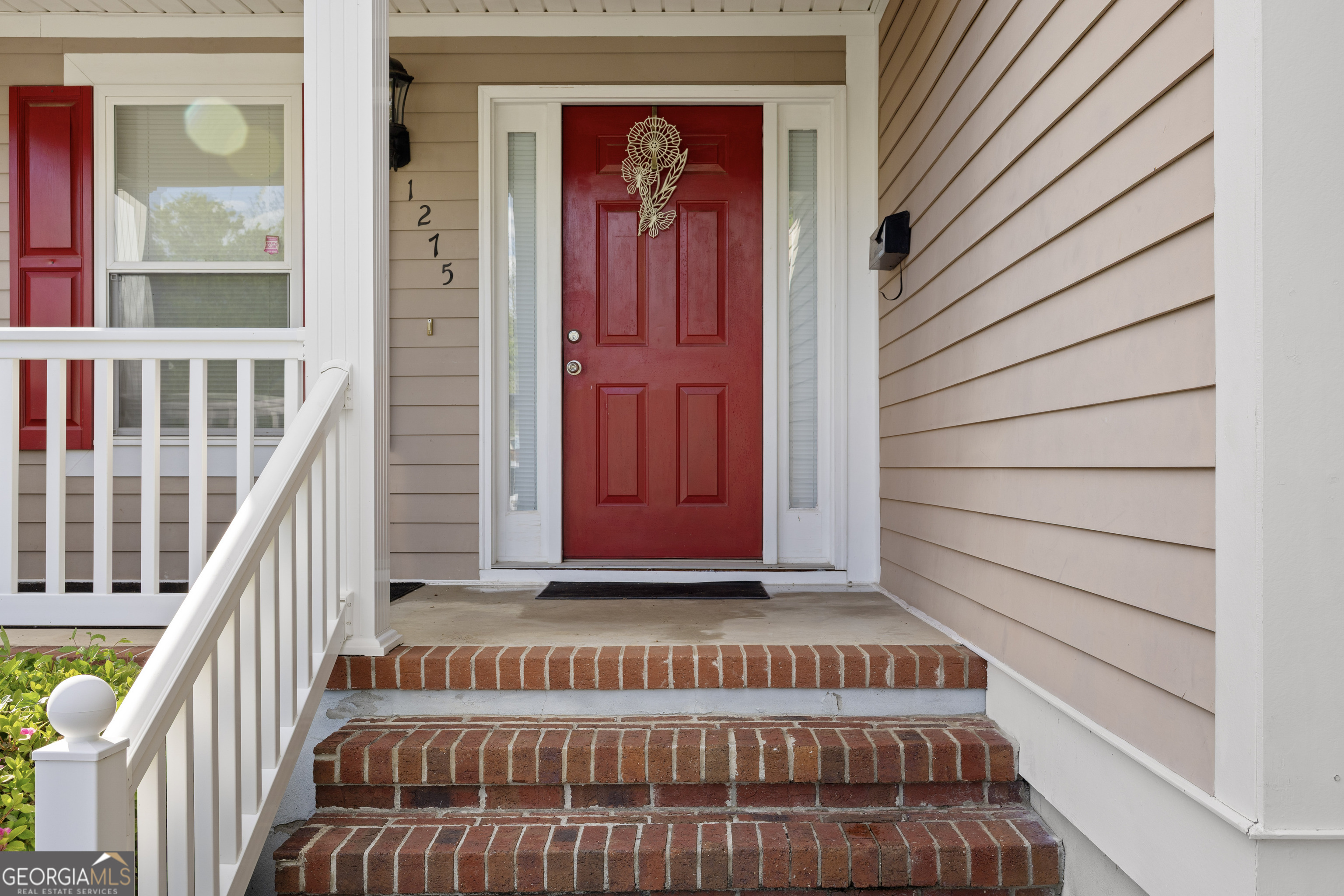 1275 Ross St Lane Macon, GA 31201 - Photo 4 of 20 a view of front door with wooden door