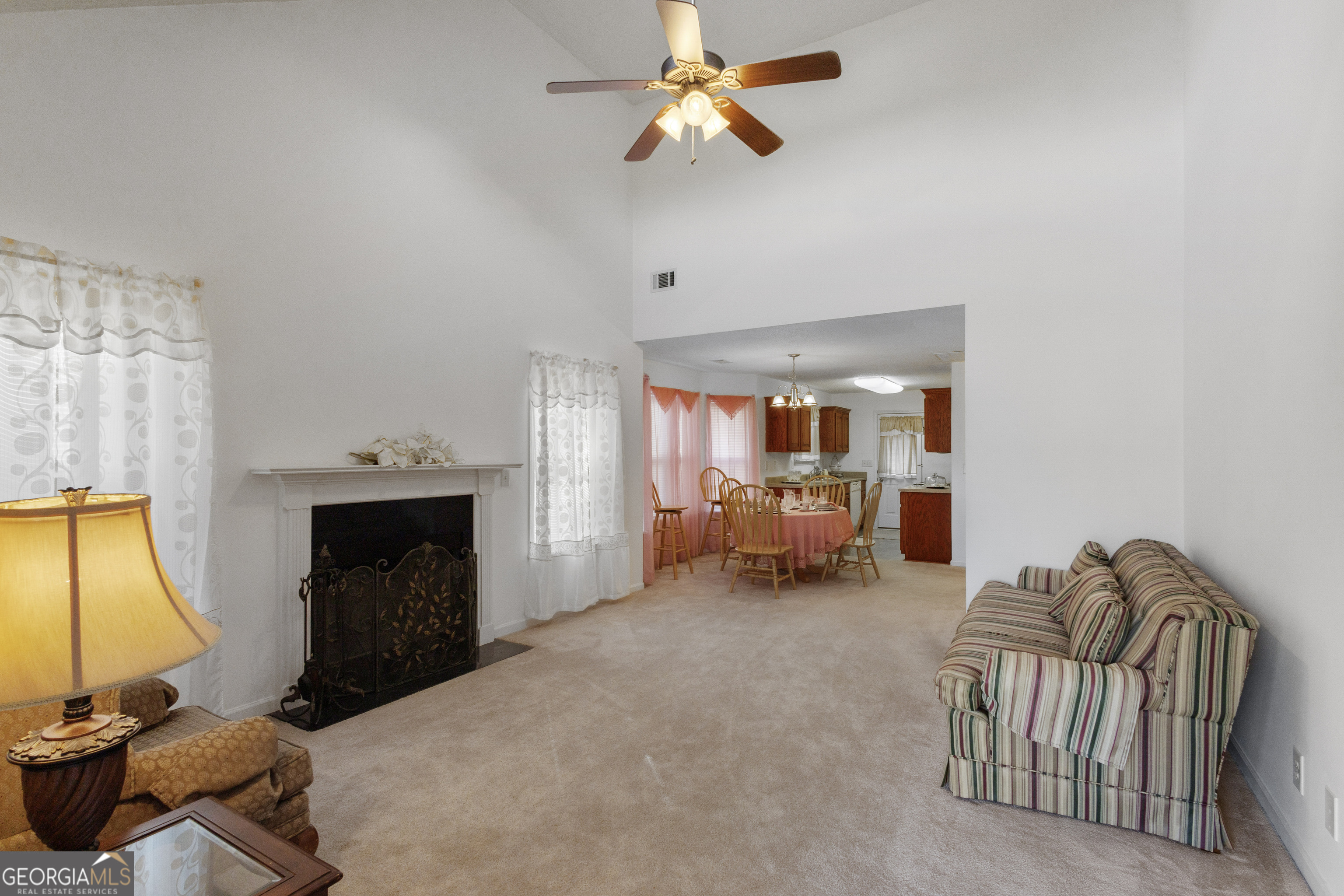 1275 Ross St Lane Macon, GA 31201 - Photo 5 of 20 a bedroom with furniture and a fireplace